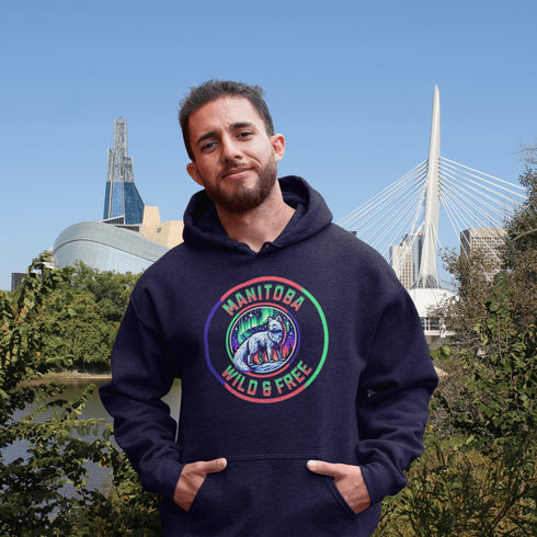 Unleash your wild side with our Manitoba – Wild & Free hoodie, featuring an enchanting graphic of an arctic fox beneath the dazzling northern lights.